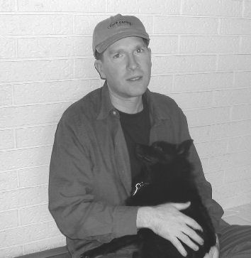 JC Harris and Gus The Little Black Dog